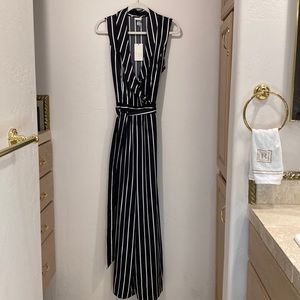 Satin wide leg pant suit. Black and White, sleeveless, shawl collar NWT